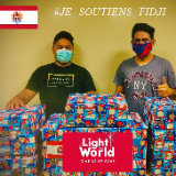 Narii-and-other-Young-Adults-spreading-the-message-of-Light-the-World-with-donations-of-clothes-for-cyclone-devastated-Fiji.--French-Polynesia,-December-2020