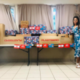 Young-adults-from-Punaauia-Stake-help-the-people-of-Fiji-by-collecting-and-boxing-clothes-from-members-of-their-stake.--French-Polynesia,-December-2020