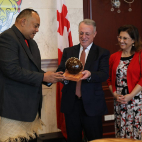 The-Honourable-Prime-Minister-of-Tonga-presented-Elder-Ulisses-Soares-with-a-carved-scene-depicting-the-birth-of-Jesus-Christ.