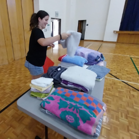 Woman-donates-bedding-to-Church-Service-Activity-in-Auckland