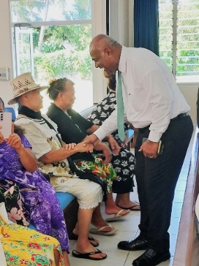 Elder Wakolo greets Cook Islands Sister