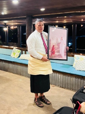 Elder Tuione presents portrait