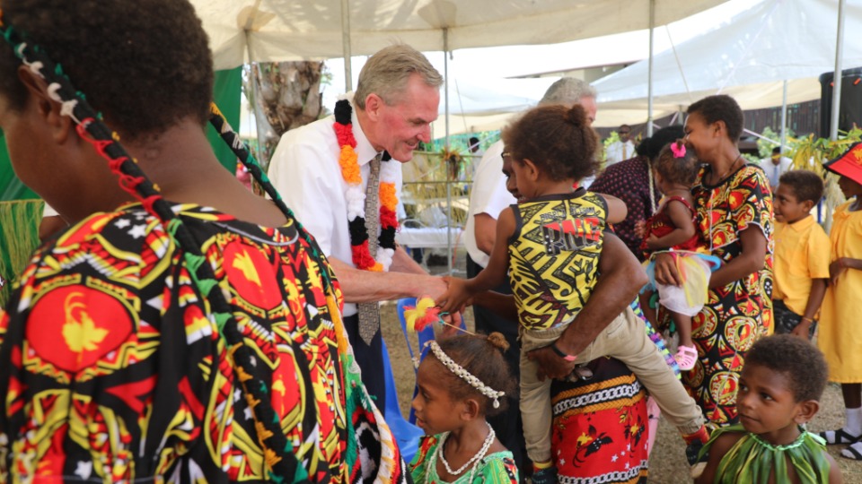 Elder-Peter-F-Meurs-Greets-Papua-New-Guinean-Mums-and-Children