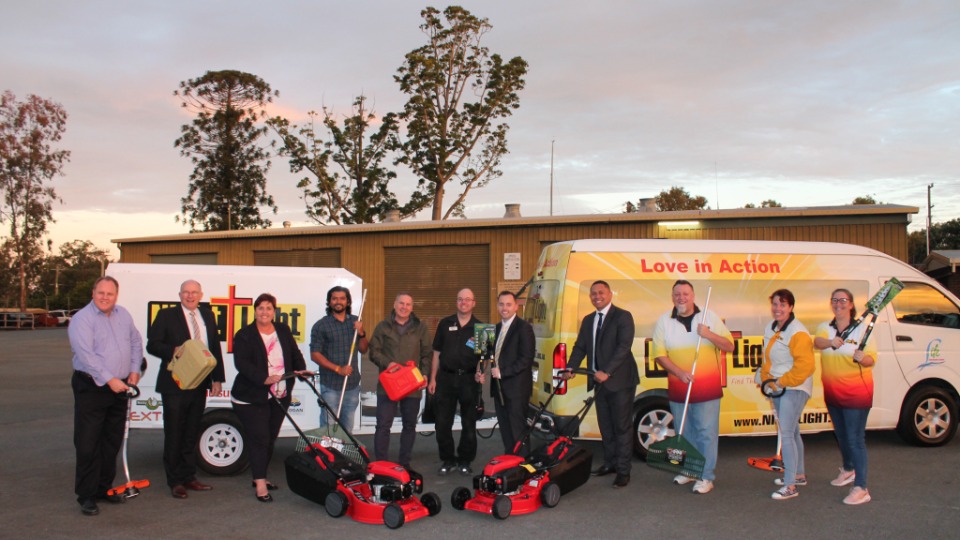 Brisbane Australia Beenleigh Stake leaders and Nightlight Outreach Inc representatives with lawn and gardening donations