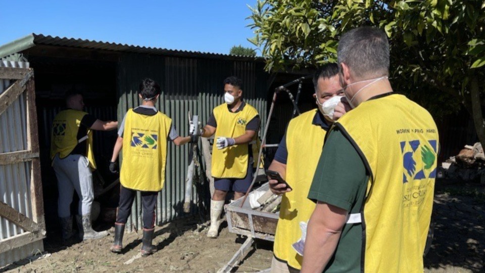 Volunteers-clean-up-after-Cyclone-Gabrielle-in-New-Zealand.