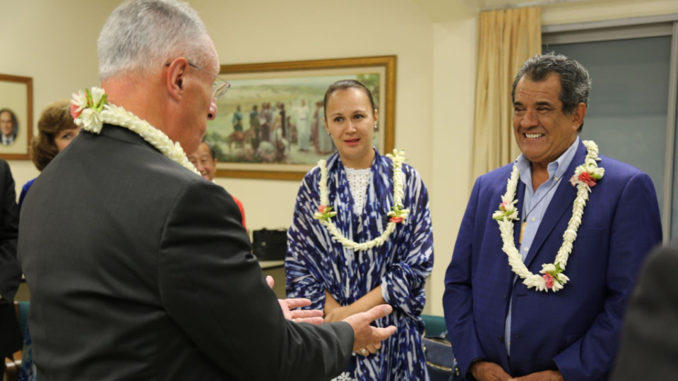 Elder-Ulisses-Soares-of-the-Quorum-of-the-Twelve-Apostles-welcomes-the-President-of-French-Polynesia,-Edouard-Fritch,-and-Angeline-Fritch-before-the-young-adult-devotional-in-Papeete.-August-2022