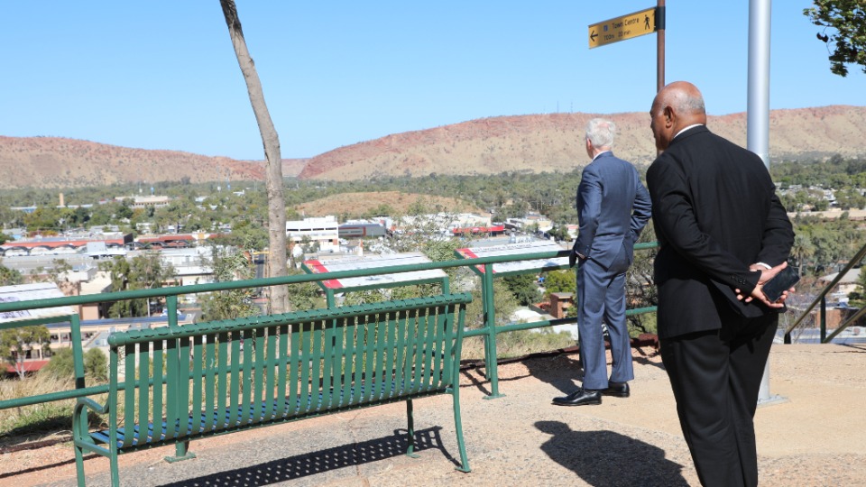 Elder D. Todd Christofferson (left) and Elder Taniela B. Wakolo look out over Alice Springs in central Australia. 26 May 2023.