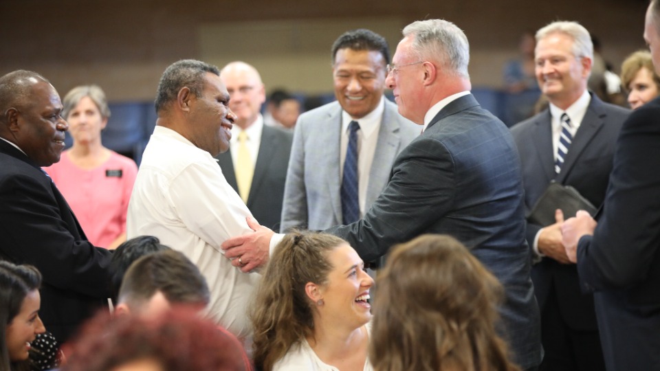 Visiting-Church-leaders-from-Papua-New-Guinea-greet-Elder-Ulisses-Soares-after-a-devotional-in-Sydney,-10-March-2023.