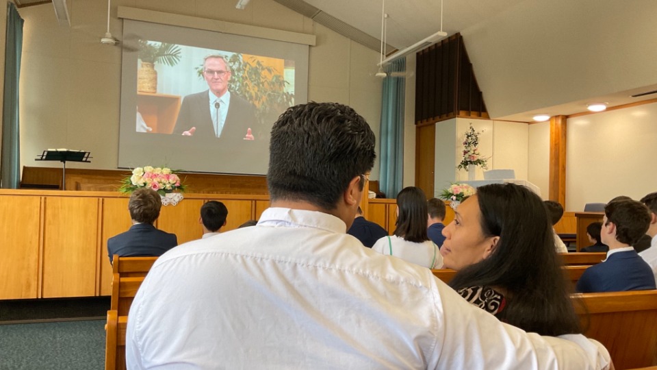 Tariu and Talalelei Fepulea'i watch an Area Presidency video which outlines ways to strengthen faith in Jesus Christ. Auckland, New Zealand. 29 January 2023.