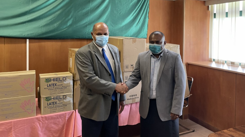 Fiji-Church-leader-Elder-Paul-Whippy-hands-over-the-donated-PPE-to-Fiji-Minister-for-Health-and-Medical-Services,-Doctor-Ifereimi-Waqainabete-to-distribute-it-to-hospitals-and-clinics.-March-2022