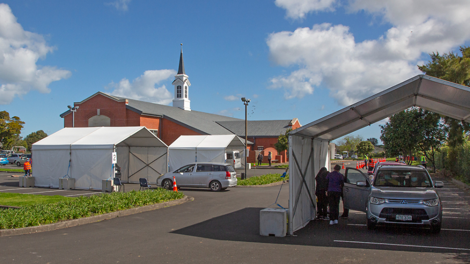 The-stake-center-in-Mangere-in-South-Auckland-was-the-site-of-Drive-Through-Vaccination-Centre-with-three-active-bays-for-delivering-vaccines-to-drivers-and-passengers.-New-Zealand,-September-2021