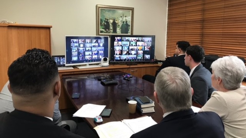 Missionaries in Queensland, Australia take part in a virtual meeting with Elder Ian S. Ardern and Sister Paula Ardern. November 2021.