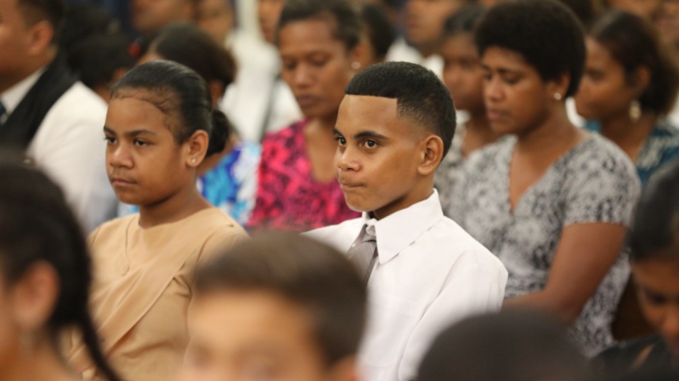 Members of the congregation during a special devotional in Nadi, Fiji with Elder Ulisses Soares of the Quorum of the Twelve Apostles of The Church of Jesus Christ of Latter-day Saints. 16 March 2023. 