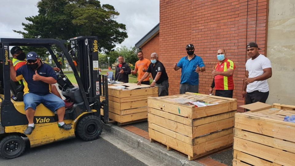 Donated-forklifts-were-used-to-load-the-packed-crates-into-the-containers-to-be-sent-to-Tonga-as-a-service-from-the-Penrose-Stake.-New-Zealand-February-2022