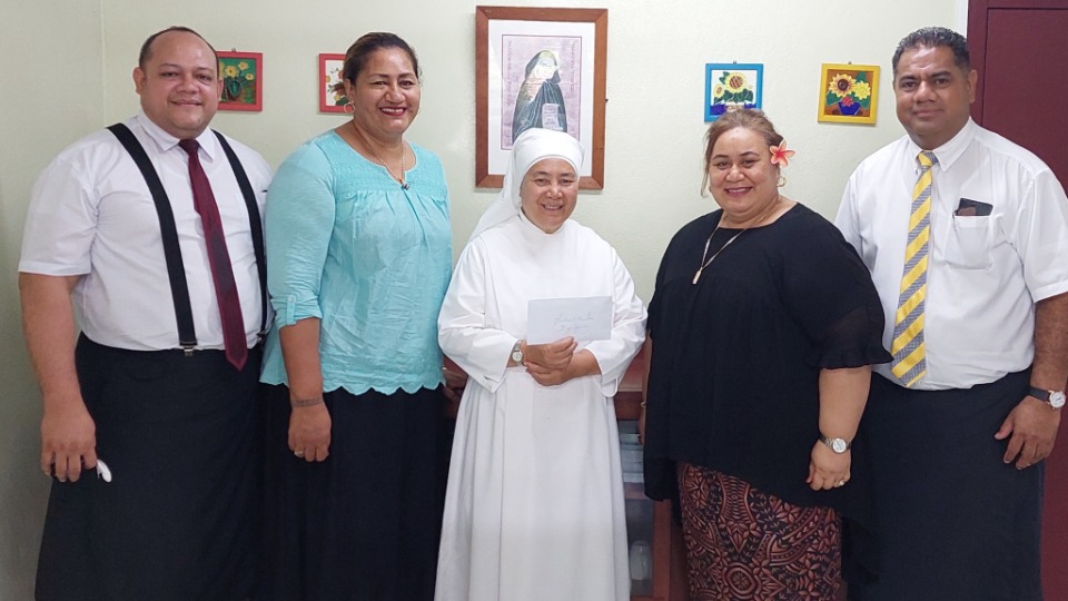 Church leaders in Samoa give a donation to 'The Littel Sisters of the Poor' in Samoa.