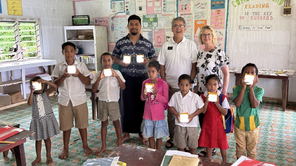 Class demonstrates their SolarBuddy LED solar lights