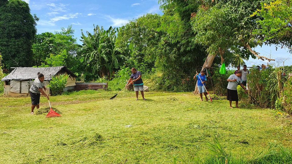 Vanuatu-Luganville-Branch-members-and-friends-serve-their-community-by-mowing-and-raking-the-grounds-at-the-Northern-Provincial-Hospital-in-February-2022.-