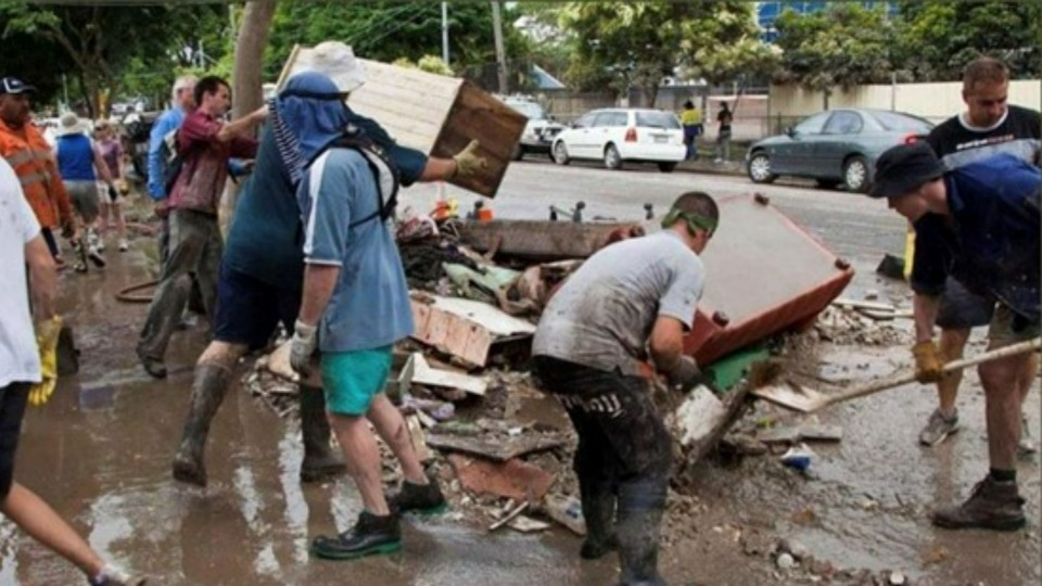 Volunteers clean up after floods in Ipswich, Australia. March 2022. Image used with permission.