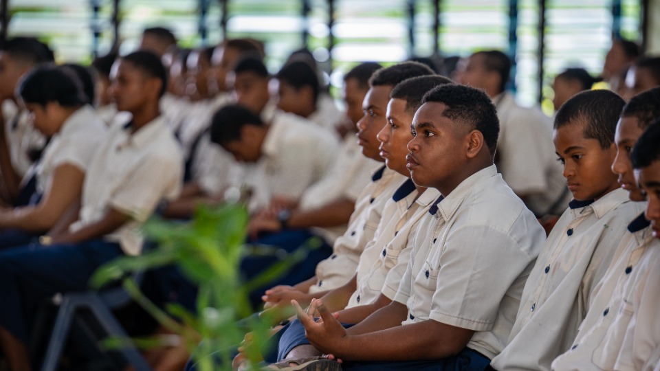 Elder-Cook-with-young-men-students