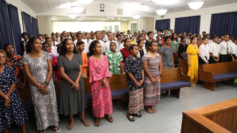 Young members of The Church of Jesus Christ of Latter-day Saints in Fiji attend a devotional with Elder Ulisses Soares. 16 March 2023.