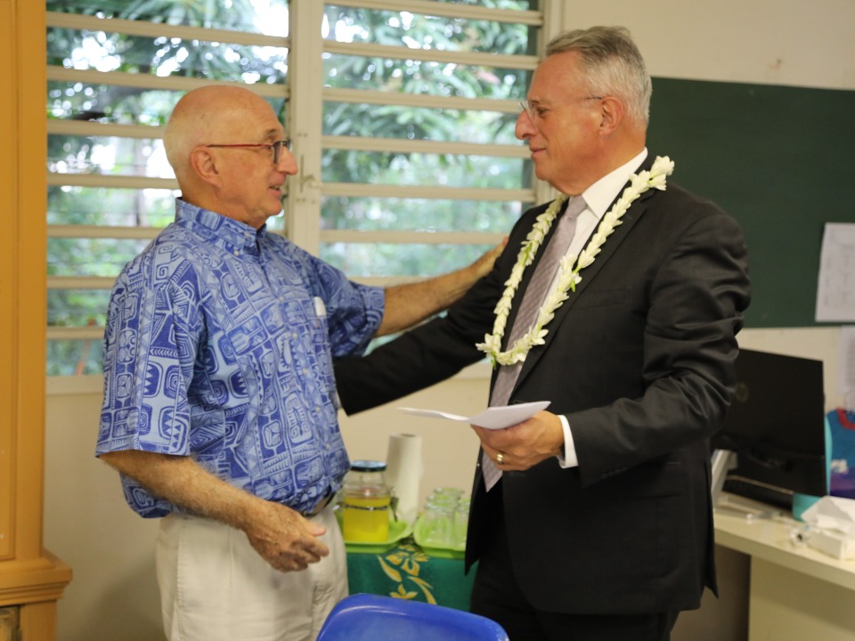 Elder Ulisses Soares and President Manutea Gay.