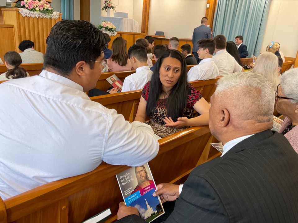 Talalelei-and-Tariu-Fepulea'i-discuss-the-2023-Pacific-Area-Focus-of-The-Church-of-Jesus-Christ-of-Latter-day-Saints-with-a-fellow-Church-member.-29-January-2023.-Auckland,-New-Zealand.