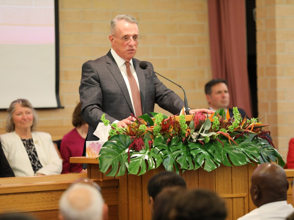 Elder Ulisses Soares speaks to members and friends of the Church in Sydney, Australia. 28 May 2022.